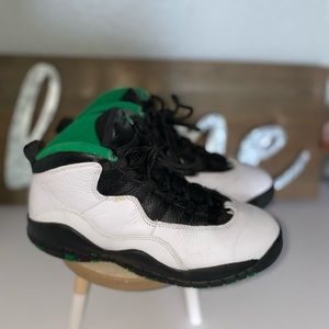 White, black and Green youth Jordan’s size 4.5. Used